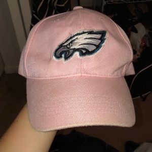 Pink Philadelphia Eagles football cap.